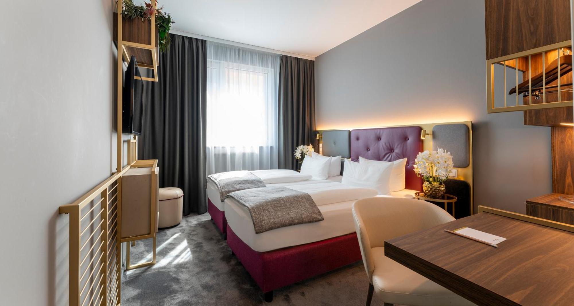 Отель Plaza Premium Muenchen Экстерьер фото